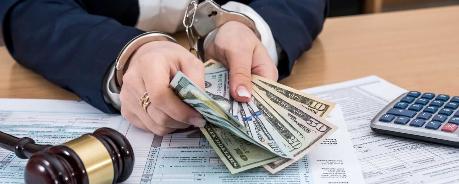 Imagen Delitos Tributarios y Aduaneros